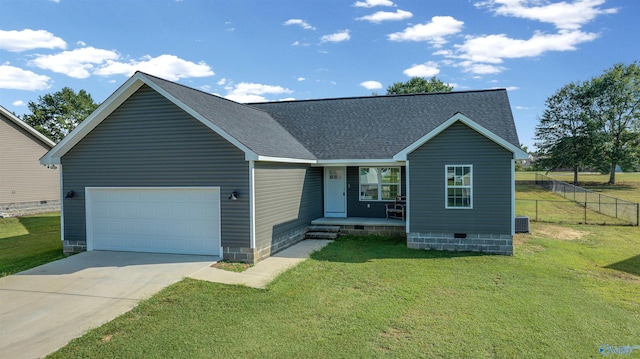 view of front facade with a front yard and a garage