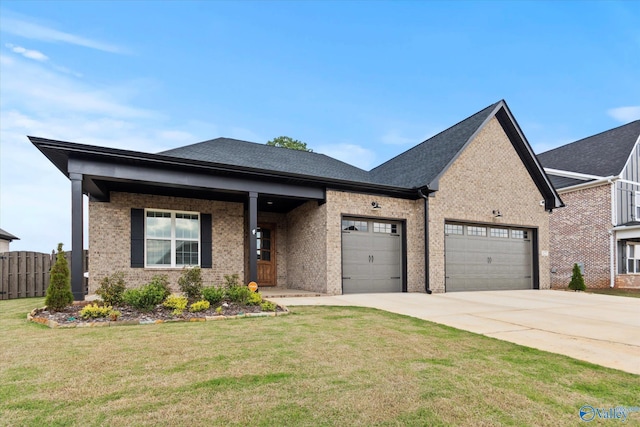 127 Parkland Hill Trce, Madison, AL 35756 - view of front of home featuring fence, a front yard, brick siding, concrete driveway, and an attached garage