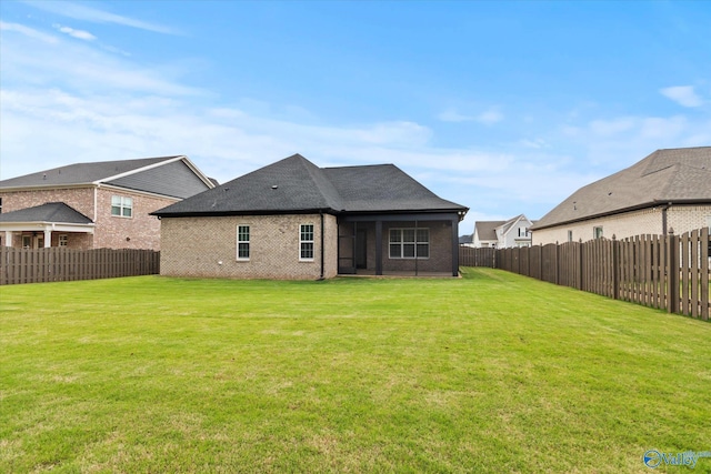 127 Parkland Hill Trce, Madison, AL 35756 - rear view of property with a fenced backyard, a lawn, and brick siding
