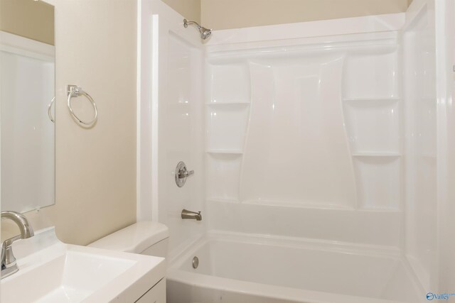 full bathroom with shower / washtub combination, vanity, and toilet