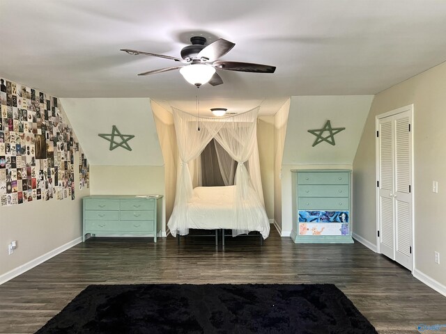 interior space with baseboards, ceiling fan, and wood finished floors