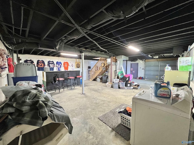 basement with washer / dryer and stairs