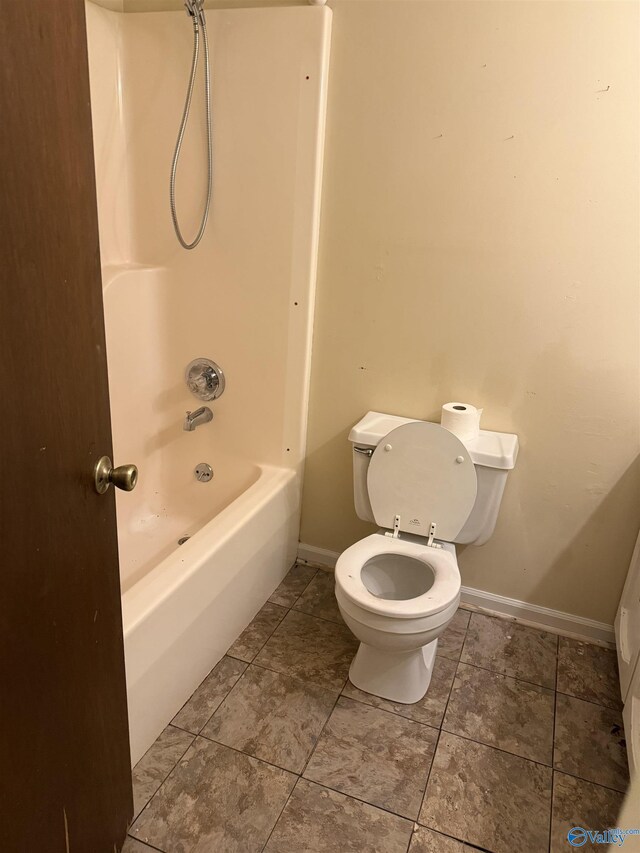 1714 Wilshire Ave SW, Decatur, AL 35603 - full bathroom with baseboards and bathtub / shower combination