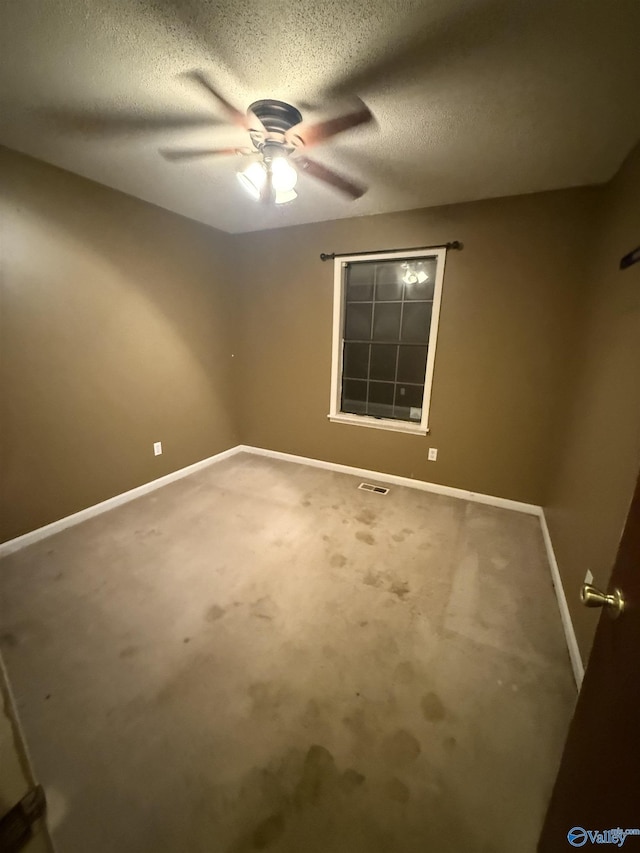 1714 Wilshire Ave SW, Decatur, AL 35603 - unfurnished room featuring a ceiling fan, carpet flooring, and a textured ceiling