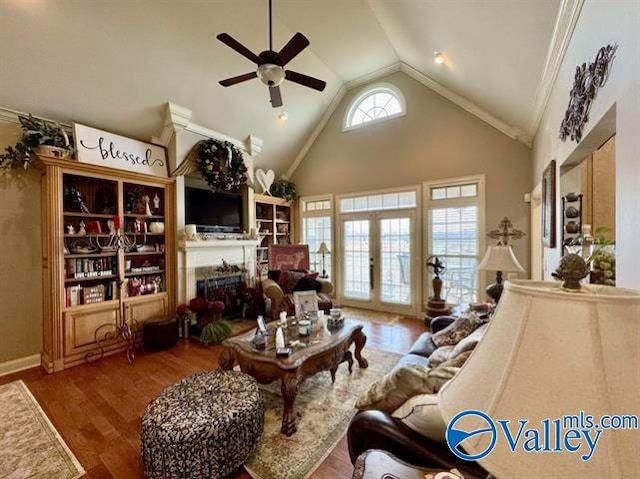 living room featuring french doors, hardwood / wood-style flooring, a wealth of natural light, and ceiling fan