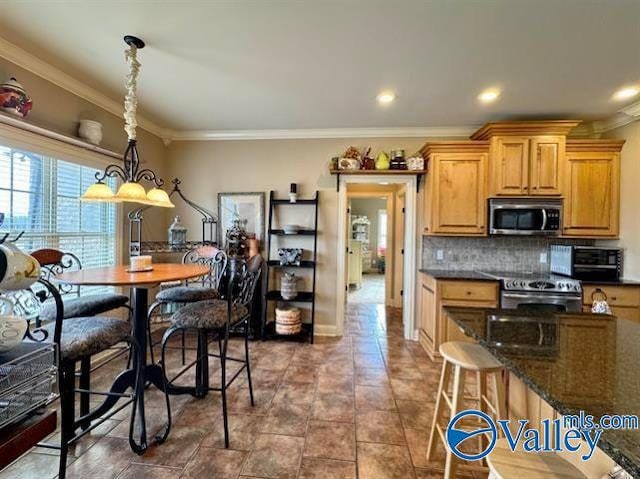 kitchen with stainless steel appliances, backsplash, dark stone countertops, pendant lighting, and ornamental molding