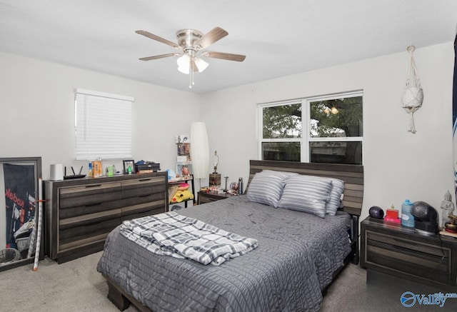 bedroom with carpet floors and a ceiling fan