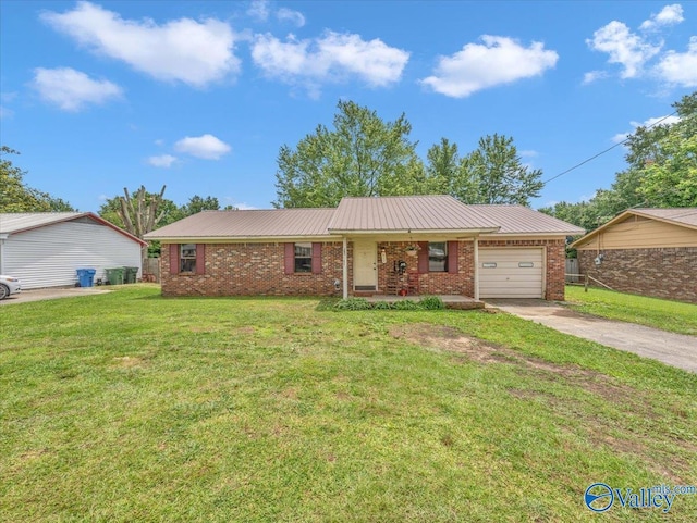 812 Mitwede St SW, Hartselle, AL 35640 - ranch-style house with a garage, driveway, brick siding, and a front lawn