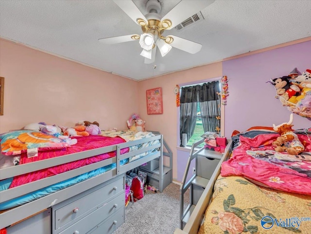 812 Mitwede St SW, Hartselle, AL 35640 - carpeted bedroom featuring ceiling fan and a textured ceiling