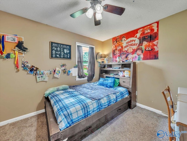 812 Mitwede St SW, Hartselle, AL 35640 - bedroom featuring carpet flooring, a textured ceiling, baseboards, and ceiling fan