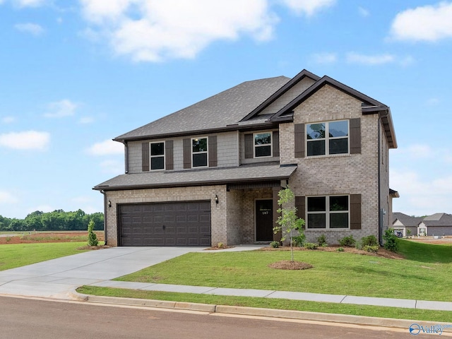 view of front of house featuring a front yard, an attached garage, brick siding, and driveway
