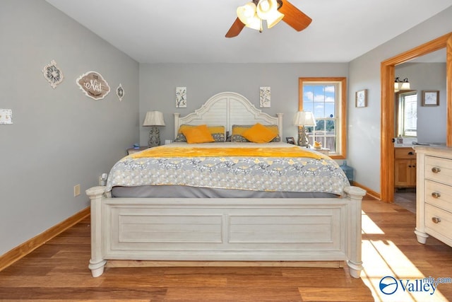 bedroom featuring ceiling fan and light hardwood / wood-style flooring