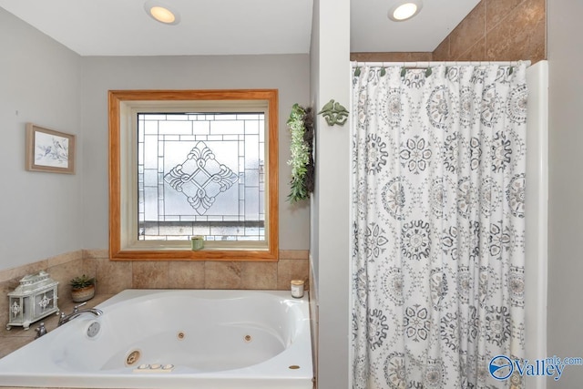 bathroom featuring independent shower and bath