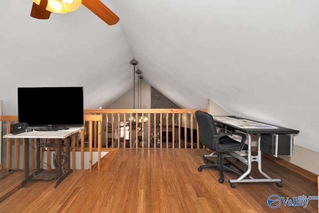 office area with ceiling fan, lofted ceiling, and hardwood / wood-style floors