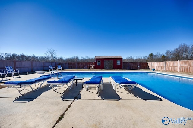 view of pool featuring an outdoor structure