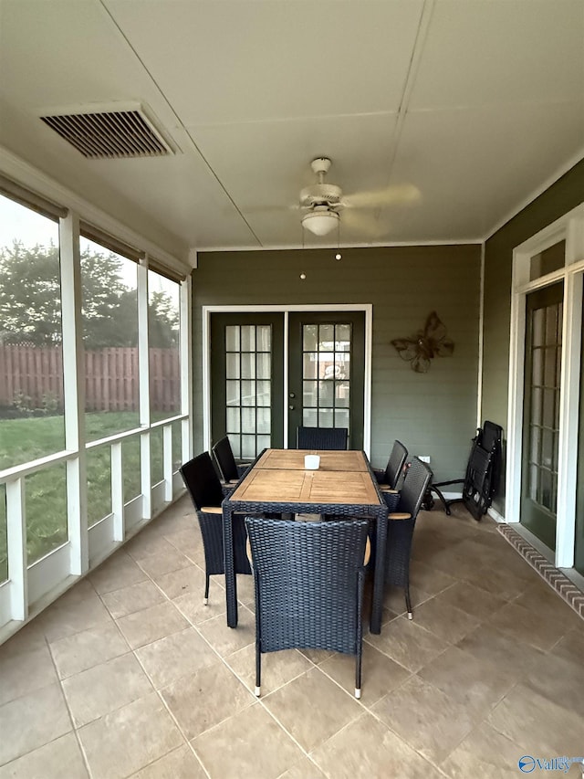 504 Sussex Dr SW, Huntsville, AL 35824 - sunroom / solarium with a ceiling fan, tile patterned floors, and outdoor dining area