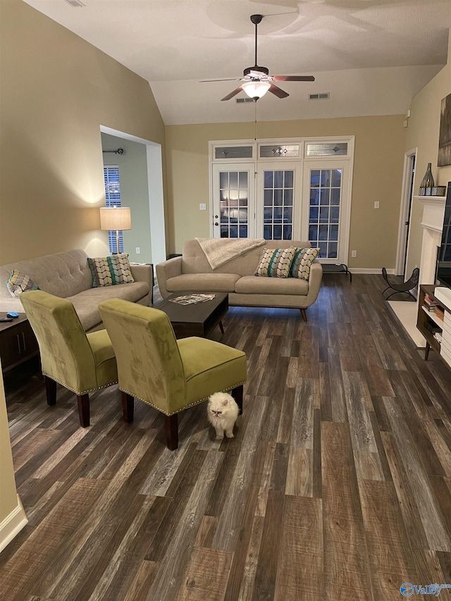 504 Sussex Dr SW, Huntsville, AL 35824 - living room featuring vaulted ceiling, a ceiling fan, wood finished floors, and baseboards
