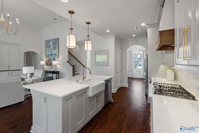 unfurnished dining area featuring lofted ceiling, dark hardwood / wood-style flooring, and a chandelier