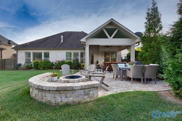 kitchen featuring premium range hood, stainless steel appliances, plenty of natural light, and an island with sink