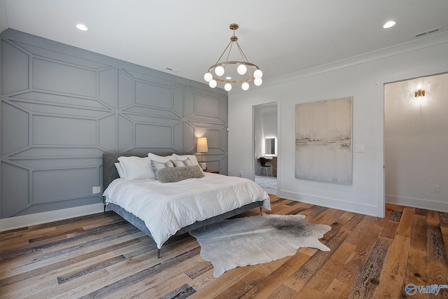 bedroom featuring hardwood / wood-style flooring