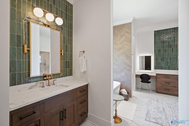 bathroom with tile patterned flooring, vanity, and ornamental molding