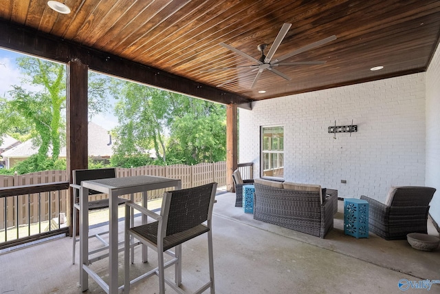 view of patio / terrace featuring ceiling fan