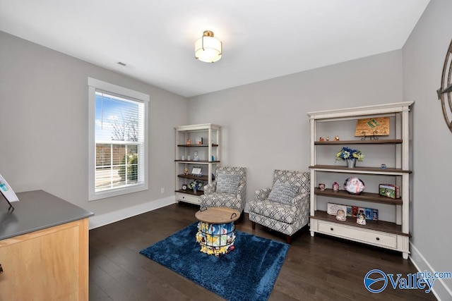 living area featuring dark hardwood / wood-style floors