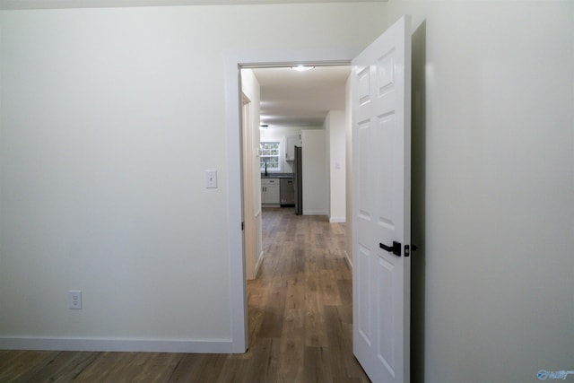 hallway featuring hardwood / wood-style flooring
