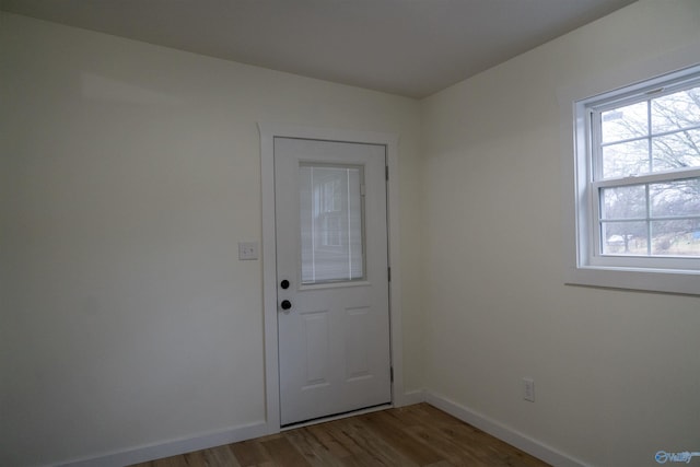 doorway featuring hardwood / wood-style floors