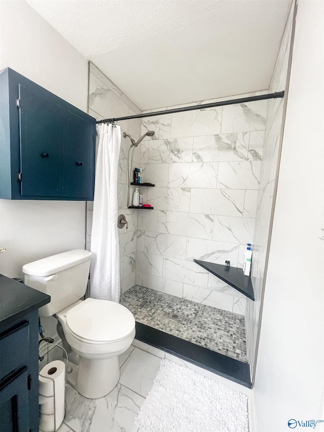 bathroom with walk in shower, vanity, toilet, and a textured ceiling