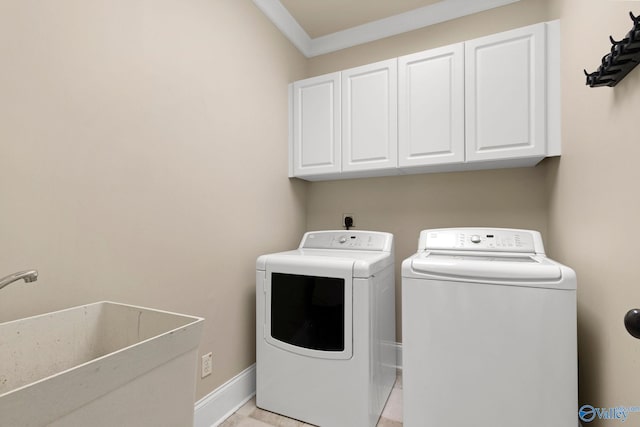 505 Barkley St SW, Hartselle, AL 35640 - clothes washing area featuring cabinet space, washing machine and dryer, ornamental molding, and baseboards
