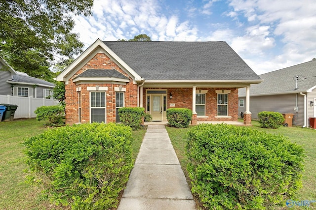 505 Barkley St SW, Hartselle, AL 35640 - view of front facade with brick siding, roof with shingles, and covered porch