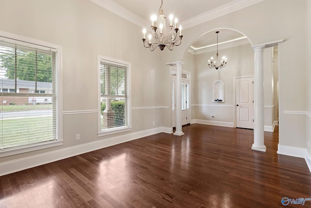 505 Barkley St SW, Hartselle, AL 35640 - unfurnished dining area with a chandelier, healthy amount of natural light, wood finished floors, ornate columns, and crown molding