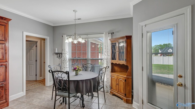 dining area with light tile patterned flooring, a chandelier, and plenty of natural light