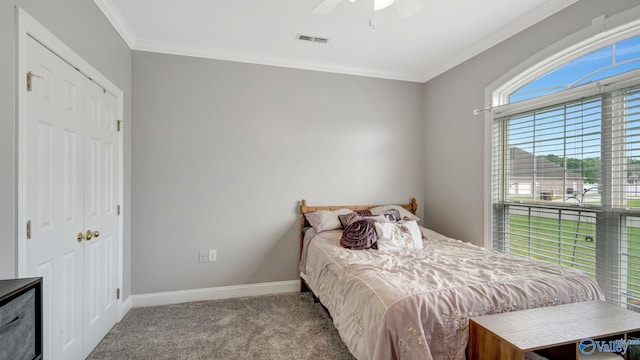 bedroom featuring carpet, visible vents, ornamental molding, and baseboards