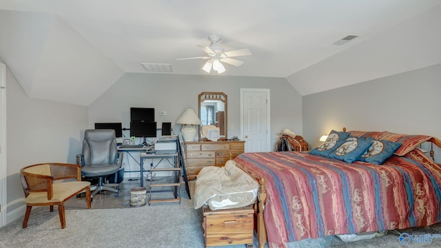 carpeted bedroom featuring lofted ceiling, visible vents, and ceiling fan