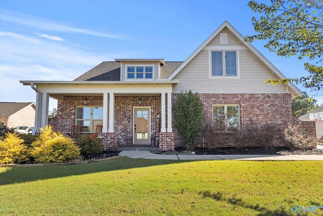 111 Starling Dr, Madison, AL 35756 - craftsman-style home with a porch, a front lawn, and brick siding