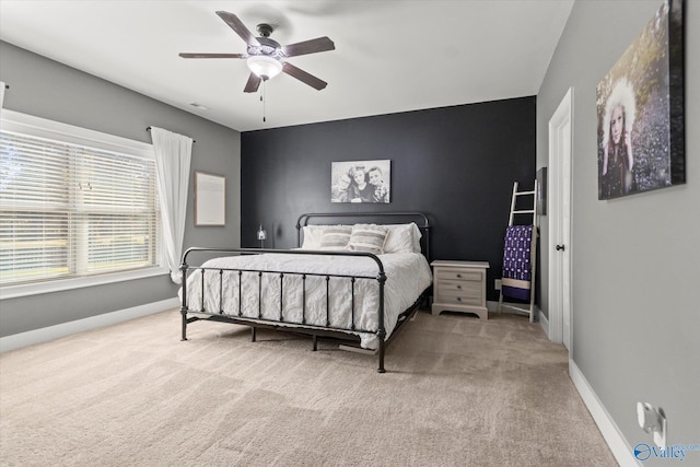 111 Starling Dr, Madison, AL 35756 - carpeted bedroom featuring a ceiling fan and baseboards