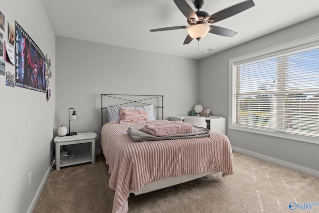 111 Starling Dr, Madison, AL 35756 - carpeted bedroom with visible vents, ceiling fan, and baseboards