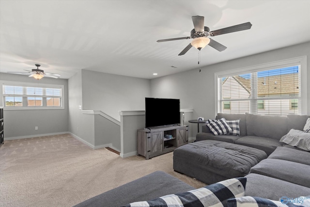 111 Starling Dr, Madison, AL 35756 - living area with ceiling fan, light carpet, and baseboards