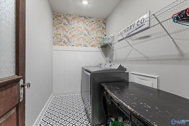 111 Starling Dr, Madison, AL 35756 - laundry area featuring laundry area, a wainscoted wall, washing machine and dryer, baseboards, and wooden walls