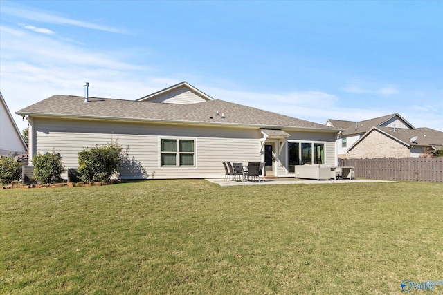 111 Starling Dr, Madison, AL 35756 - back of house with a lawn, an outdoor hangout area, a patio area, and fence