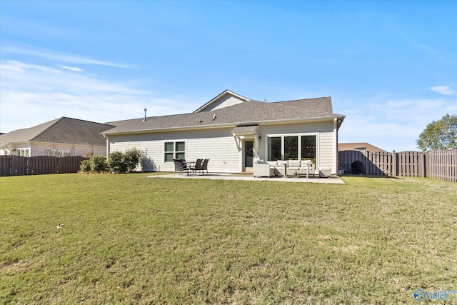 111 Starling Dr, Madison, AL 35756 - back of property with a patio, a yard, outdoor lounge area, and a fenced backyard