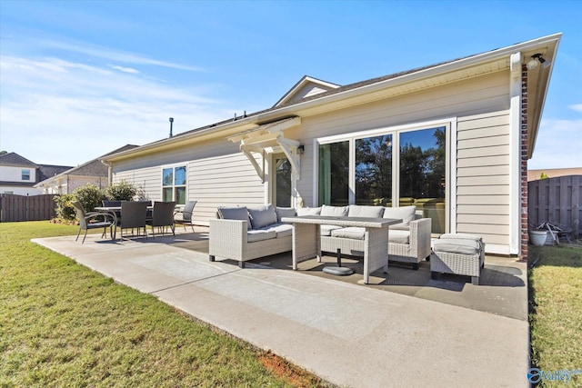 111 Starling Dr, Madison, AL 35756 - back of property featuring outdoor lounge area, fence, a patio, and a lawn