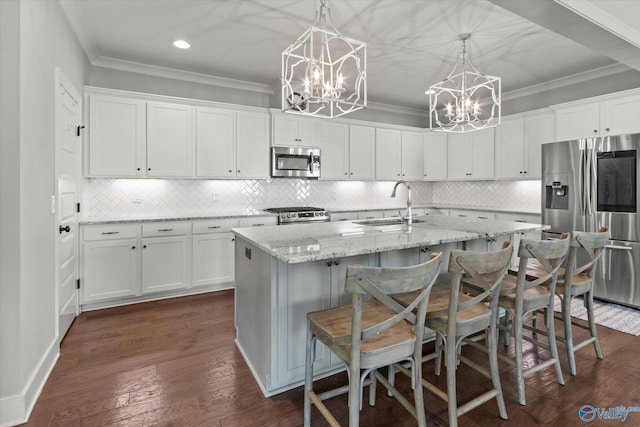 111 Starling Dr, Madison, AL 35756 - kitchen featuring an inviting chandelier, appliances with stainless steel finishes, crown molding, and a sink