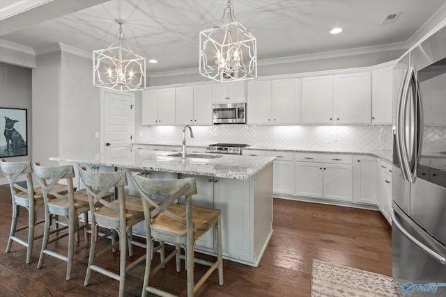 111 Starling Dr, Madison, AL 35756 - kitchen featuring stainless steel appliances, a notable chandelier, crown molding, and a sink