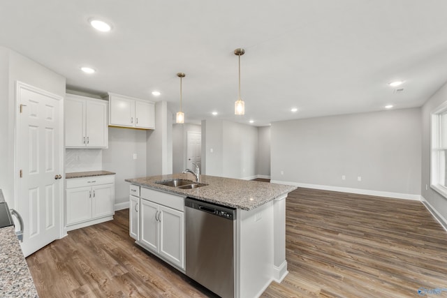 kitchen with a sink, a center island with sink, white cabinetry, and dishwasher