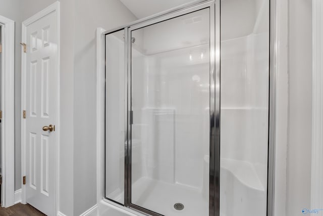 bathroom with a stall shower