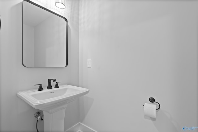 bathroom featuring baseboards