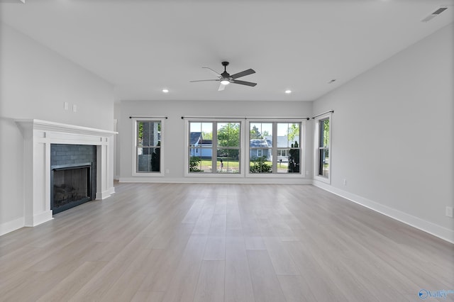 unfurnished living room with recessed lighting, light wood-style floors, and ceiling fan